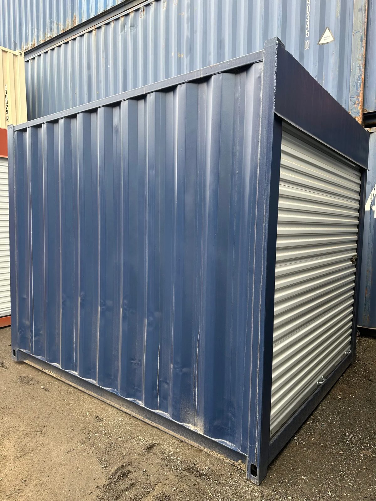 10ft Non-ISO Storage Container – Roll-Up Door – Three-quarter exterior view of container with closed roll-up door
