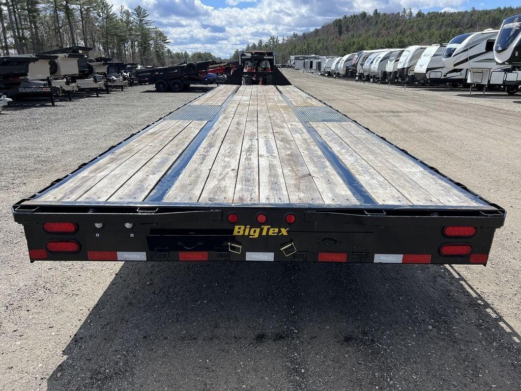 2023 Big Tex 40 ft Equipment Trailer – Slide-Out Ramps – High angle rear view looking down the length of the wooden trailer deck