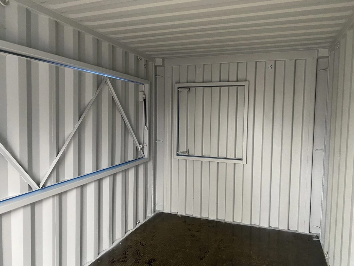 15ft Custom Container Bar & Kiosk – Side Service Hatches – empty container interior with two closed service hatches