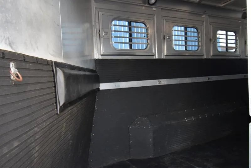 2008 C and C Trailers 4 Horse Bumper Pull – Hay Pod – Interior wall of the trailer showing windows and lower kick mats