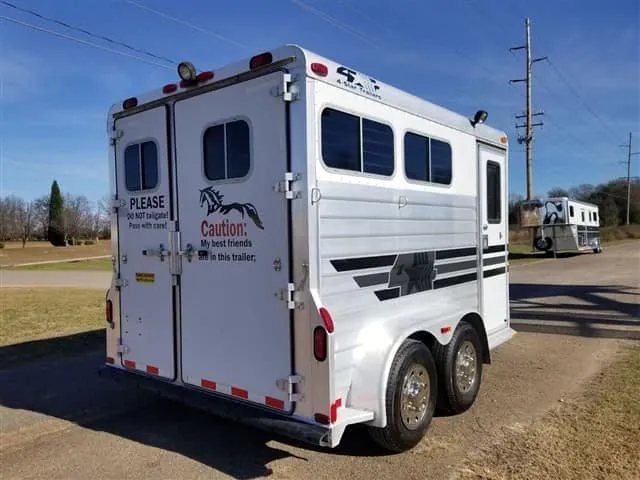2001 4 Star 2 Horse Bumper Pull Trailer – Slant Load – Rear three-quarter view from the street side showing the full trailer length
