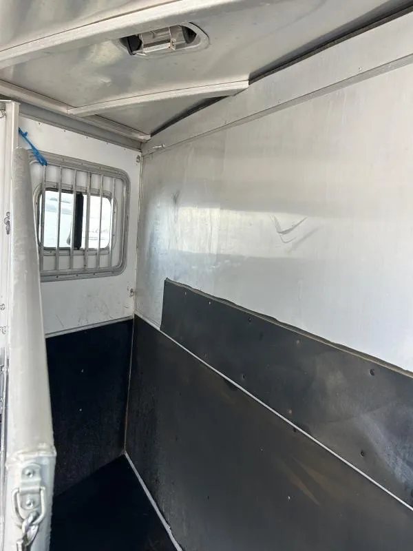 2007 Exiss SS-20 2 Horse Trailer – Collapsible Rear Tack – Interior horse stall area with rubber mats on the lower walls