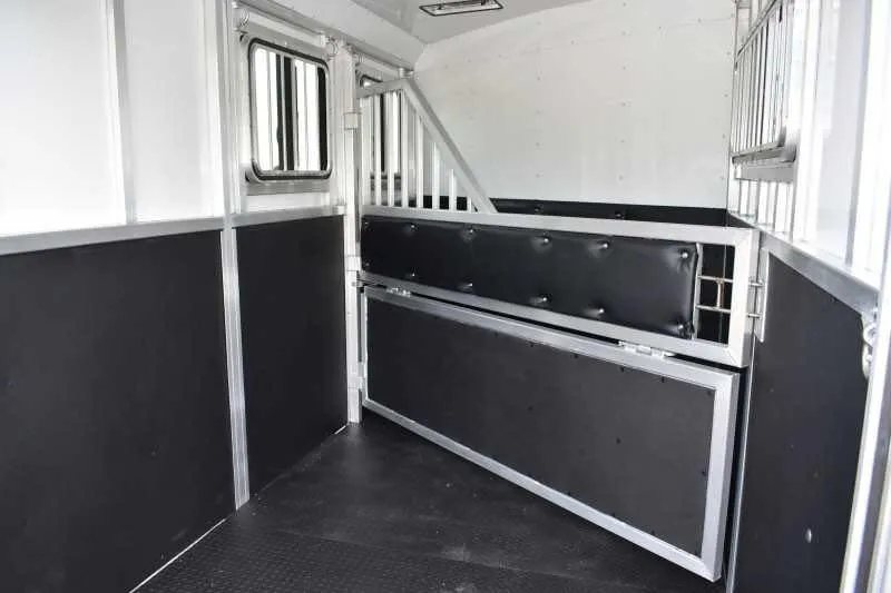 2019 Trailers USA 2 Horse Trailer – Aluminum, Dressing Room – Interior stall area showing the adjustable divider and padded wall sections