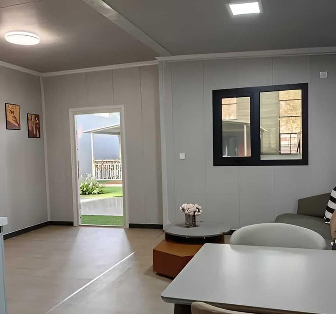 40ft Foldable Home – 3 Bedrooms, Glazed Front – Bright open-plan living and dining bay across the front of the home