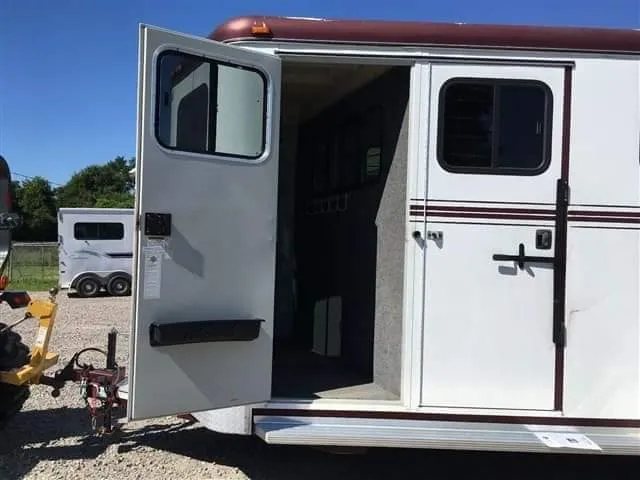 2007 Hawk 2 Horse Bumper Pull Trailer – Side Ramp – An open dressing room door on the side of the trailer