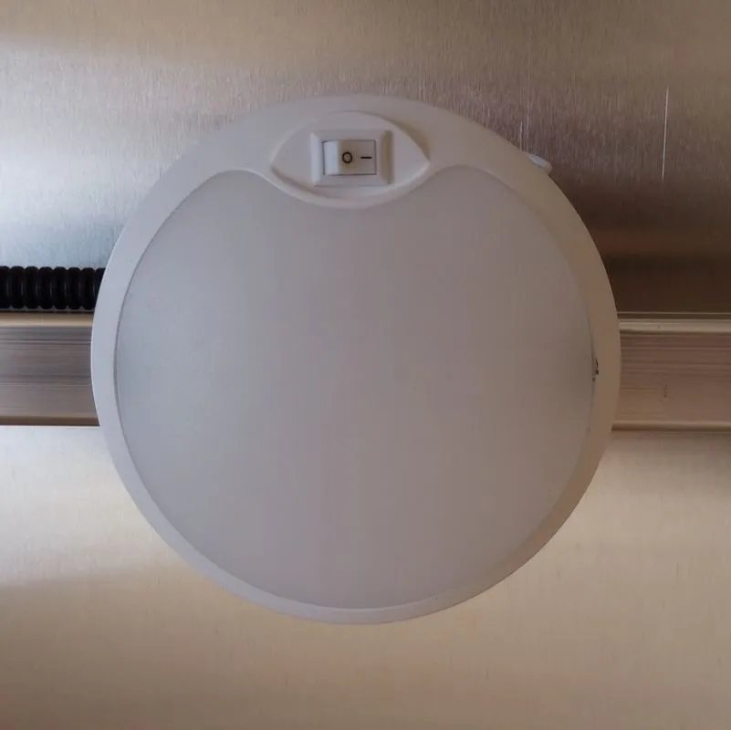 2024 Mission Trailers 12 ft Powersports – Side X Side – Circular white interior LED dome light with a built in power switch