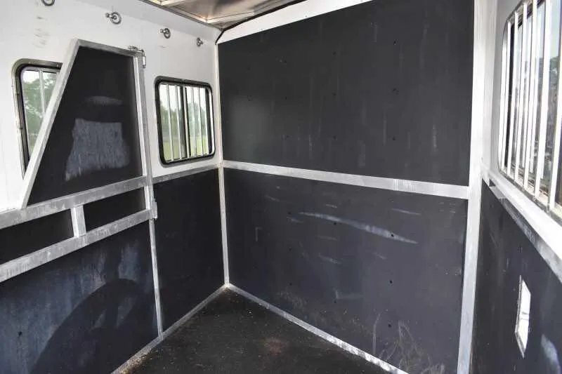2013 Shadow 2HSL 2 Horse Trailer – Aluminum, Dressing Room – View of the horse trailer interior showing the rubber wall padding and windows