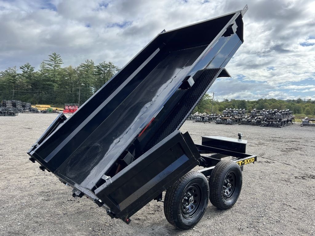 2024 Griffin Trailers 10 ft Dump – Barn Door Gate – Rear three-quarter view of the black dump trailer with the bed fully raised