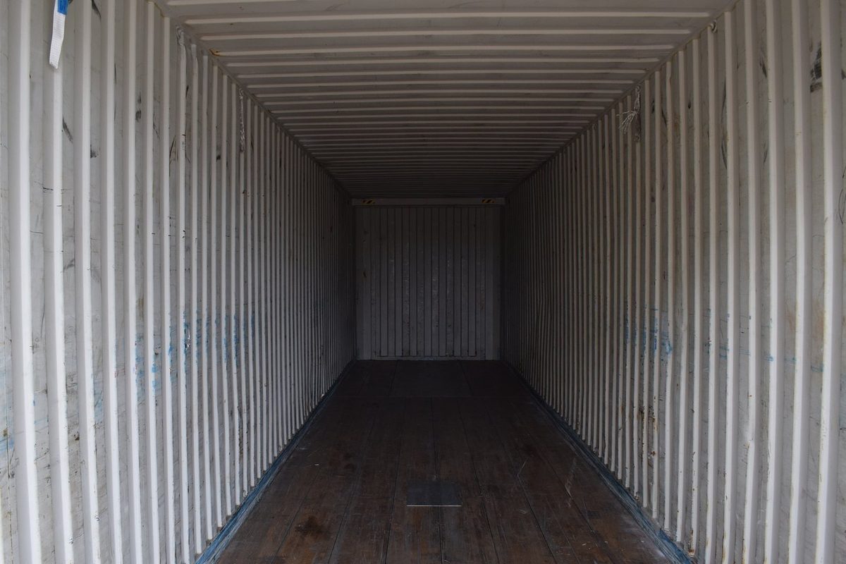 45ft High Cube Shipping Container – New, Extended Storage – empty container interior with corrugated walls and wooden floor