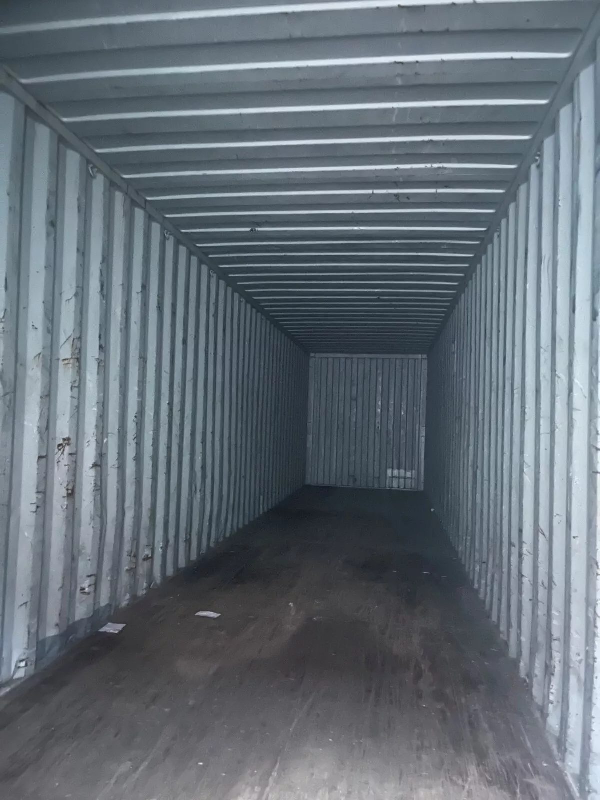 40ft Used High Cube Shipping Container – Lockable Cargo Doors – empty container interior with worn wooden floor and corrugated walls