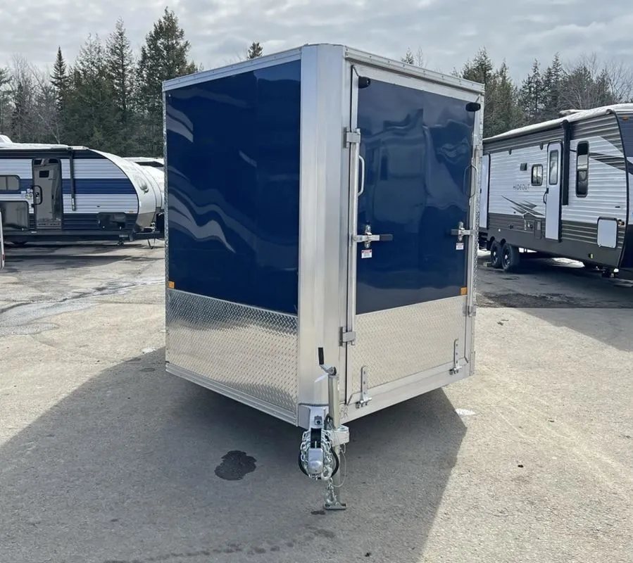2023 High Country 14 ft Trailer – Blue, Drive-Through – Front view of the V-nose trailer with the front ramp door closed