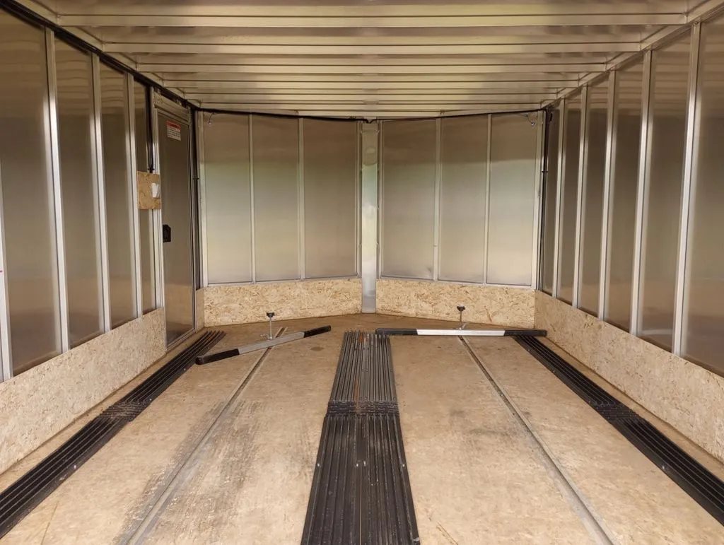 2022 Sno Pro Trailers Hybrid 2.0 – Charcoal Snowmobile Trailer – Full interior view looking forward into the V-nose section of the trailer