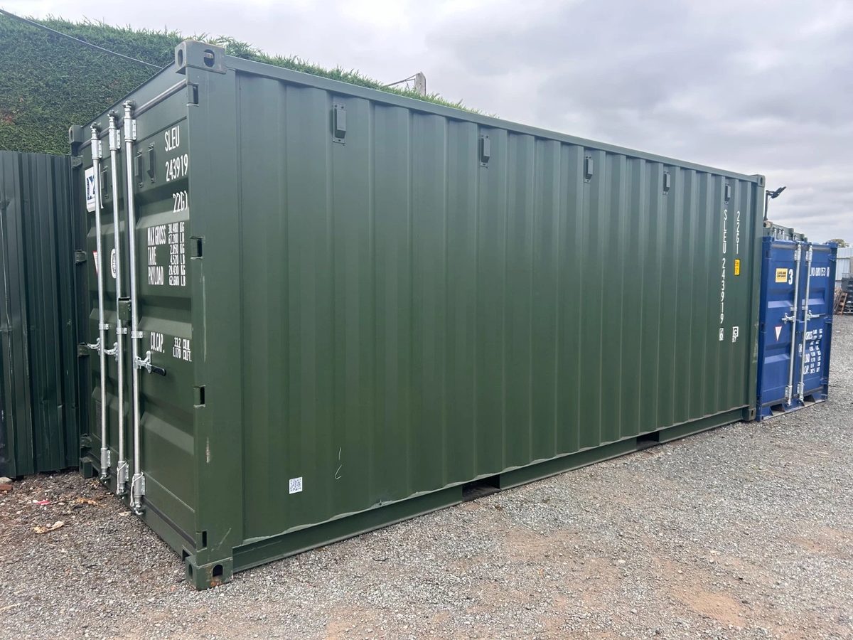 20ft New Shipping Container – One-Trip, Double Doors – three-quarter exterior view of green container with closed cargo doors