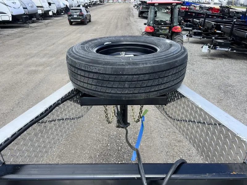 2024 Alum-Line 24 ft Gooseneck – Flip-Over Ramps – Top-down view of the gooseneck neck area showing the mounted spare tire