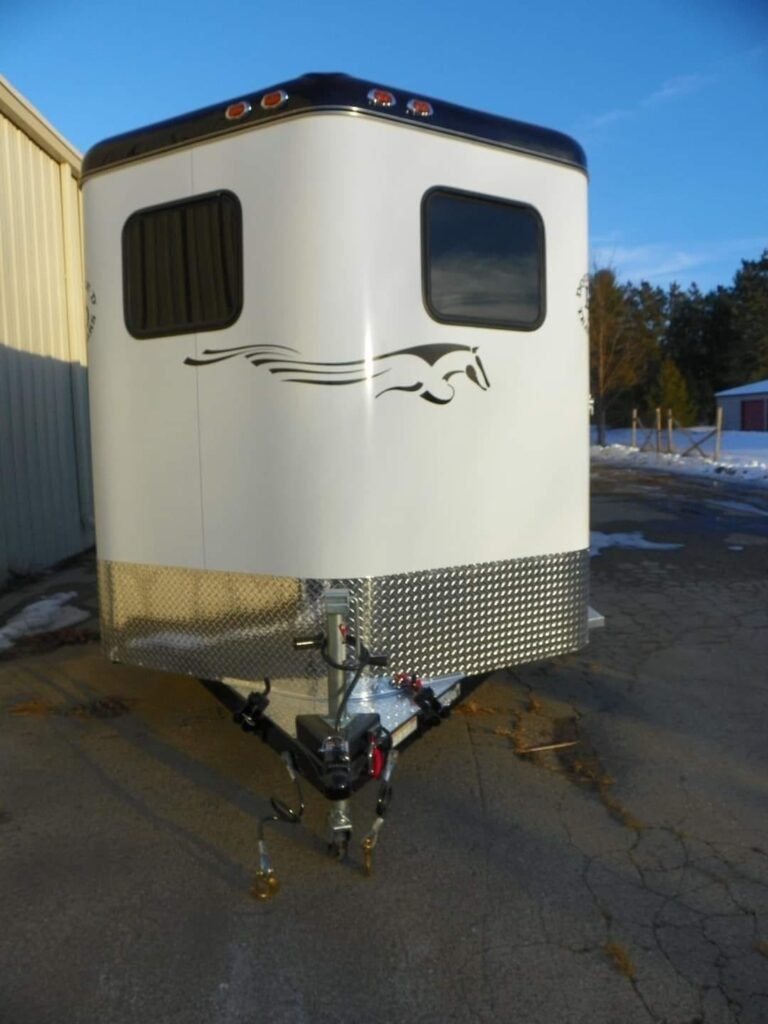 2022 Double D 2 Horse Bumper Pull – Reverse Slant – Front view of the trailer nose showing hitch and diamond plate