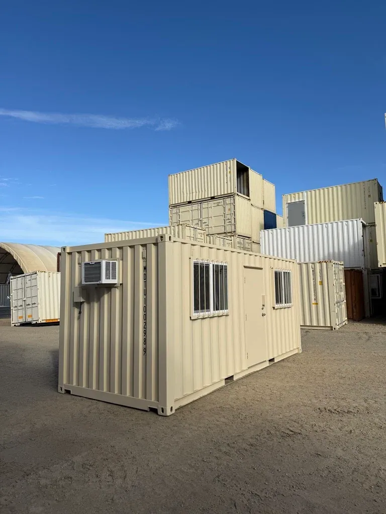 20ft Ground-Level Office Container – Insulated Workspace – three-quarter exterior of office container with windows and air conditioner
