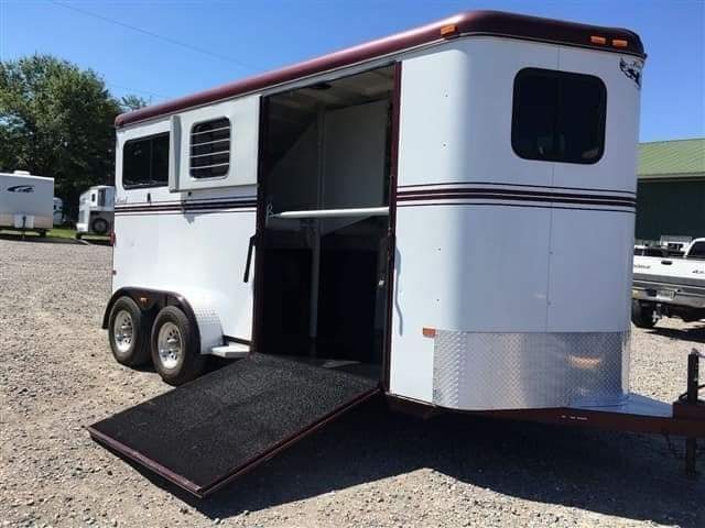 2007 Hawk 2 Horse Bumper Pull Trailer – Side Ramp – A side ramp deployed on the white horse trailer showing the interior stall area