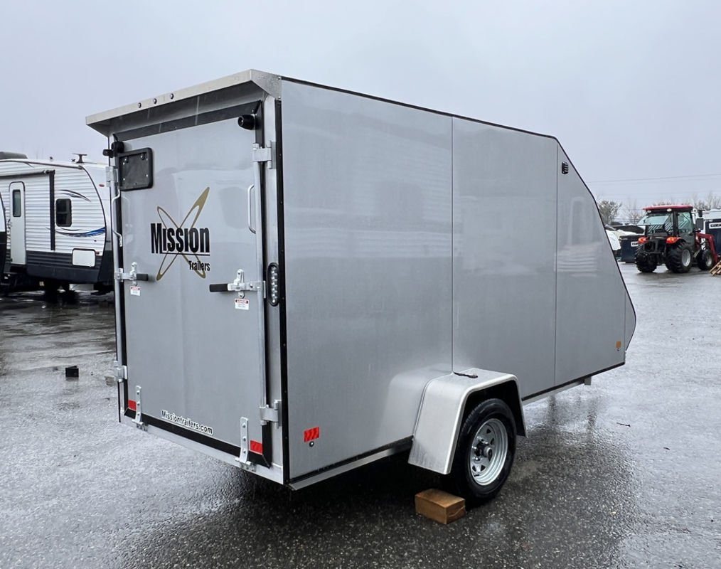 2024 Mission Trailers Crossover Trailer – Galvanized Package – Rear three-quarter view from the driver side showing closed rear ramp