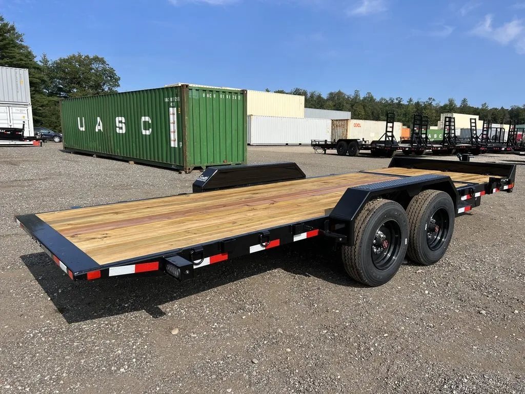 2024 Rice Trailers 20 ft Tilt Deck – Spare Mount – Three-quarter rear view of the trailer showing dual axles and black frame