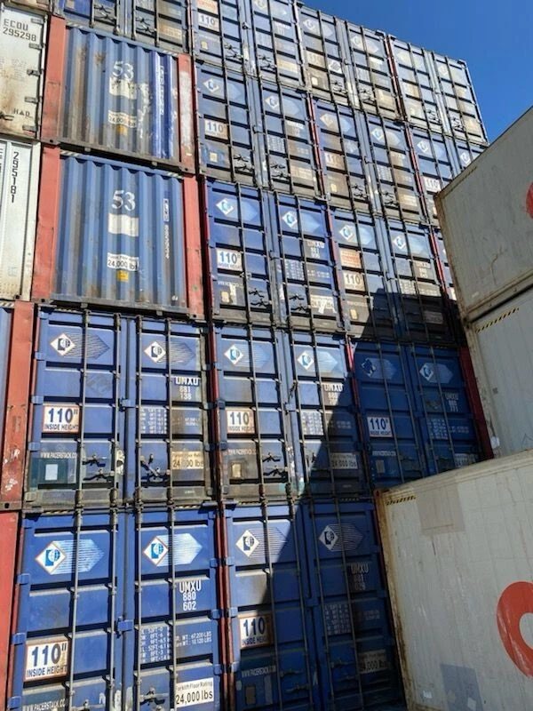 53ft High Cube Steel Shipping Container – Double End Doors – tall stacks of blue shipping containers with closed doors
