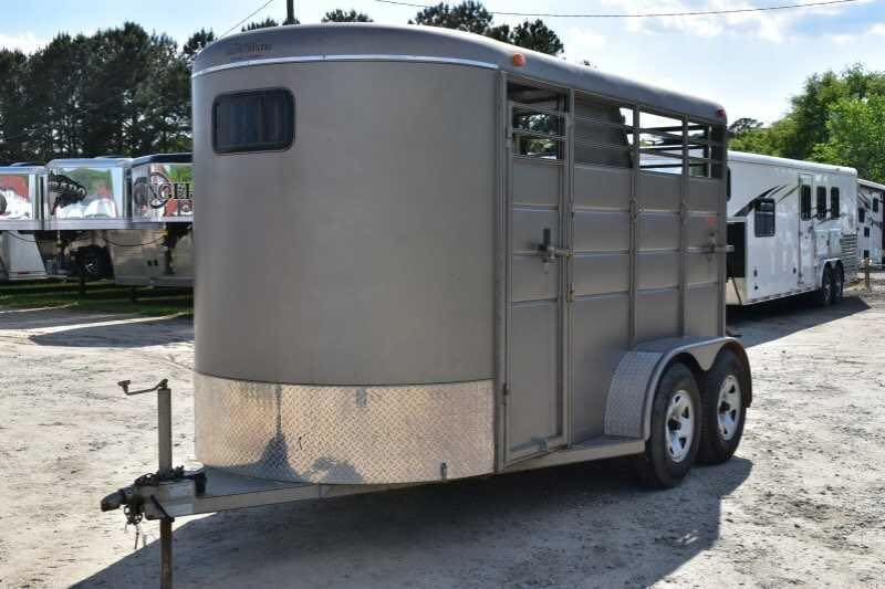 2010 Calico 2 Horse Trailer – Steel, Walk-In Dressing Room – Front three-quarter view of a grey two-horse bumper pull trailer with diamond plate trim