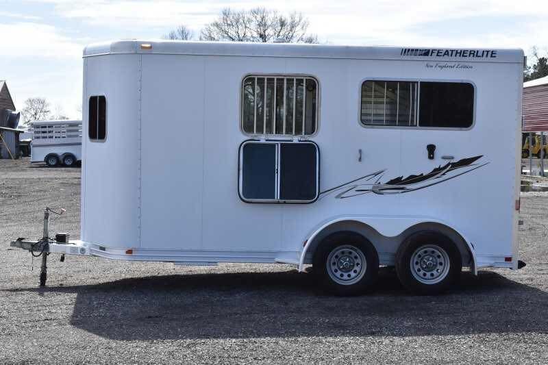 2005 Featherlite 2HST Horse Trailer – Walk-Through Dressing Room – Right side view of trailer showing drop down windows and decals