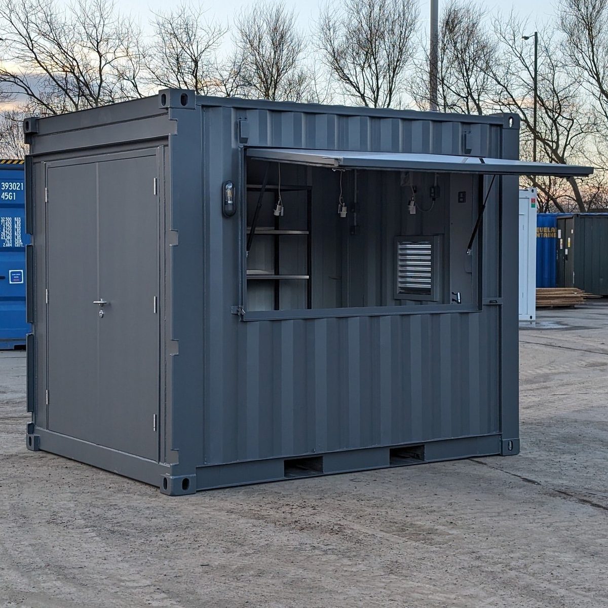 10ft Custom Pop-Up Bar Container – Full-Width Serving Hatch – grey container bar with raised serving hatch and side door