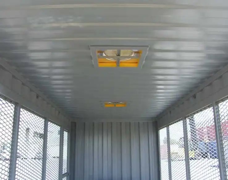 20 ft Gas Cylinder Storage Container – Yellow – Interior view looking towards the ceiling showing two roof vents and mesh walls