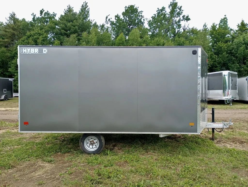 2022 Sno Pro Trailers Hybrid 2.0 – Charcoal Snowmobile Trailer – Direct side profile of the charcoal grey trailer showing the single axle