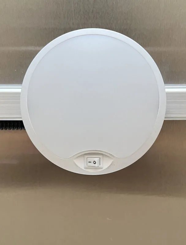 2024 E-Z Hauler 24 ft Trailer – Rear Canopy – Circular white interior LED dome light with an integrated power switch
