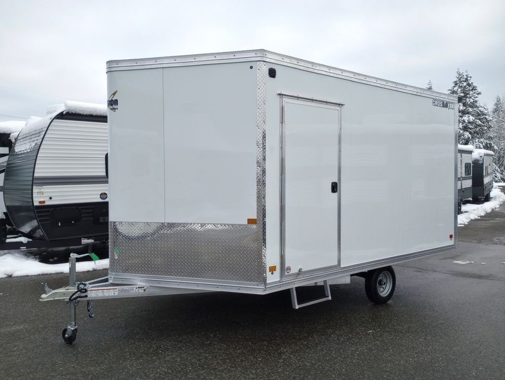 2024 Mission Trailers 12 ft Powersports – Side X Side – Front three-quarter view of the white trailer showing the side entry door and hitch