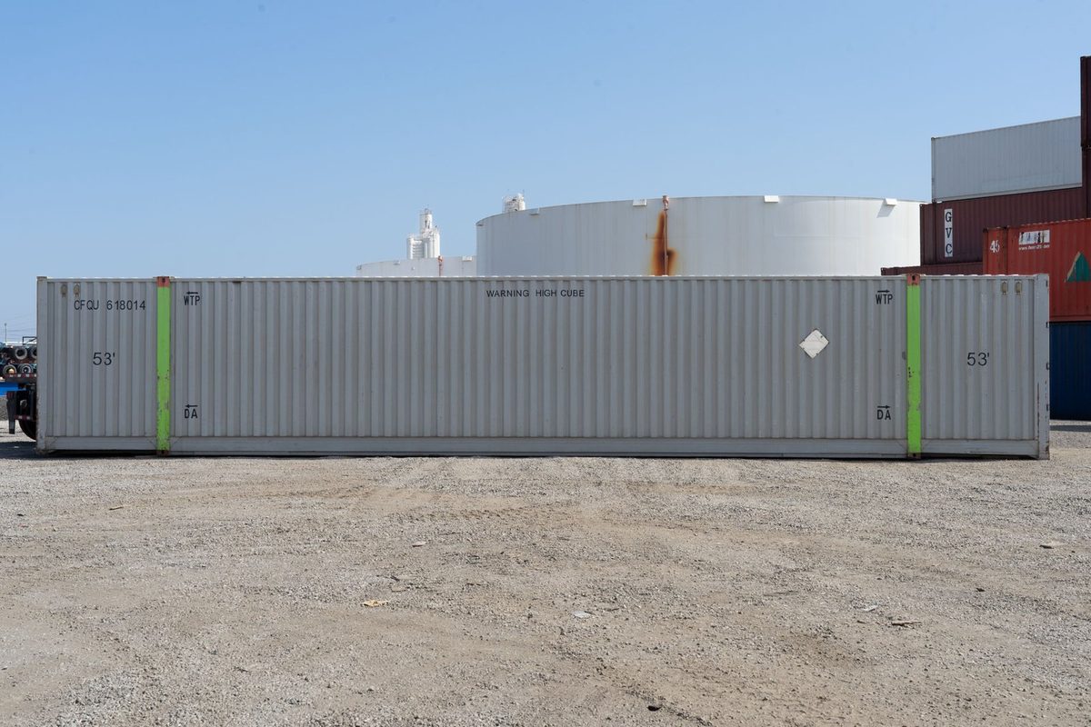 53ft High Cube Shipping Container – Used, Cargo Worthy – full side view of long container in industrial yard