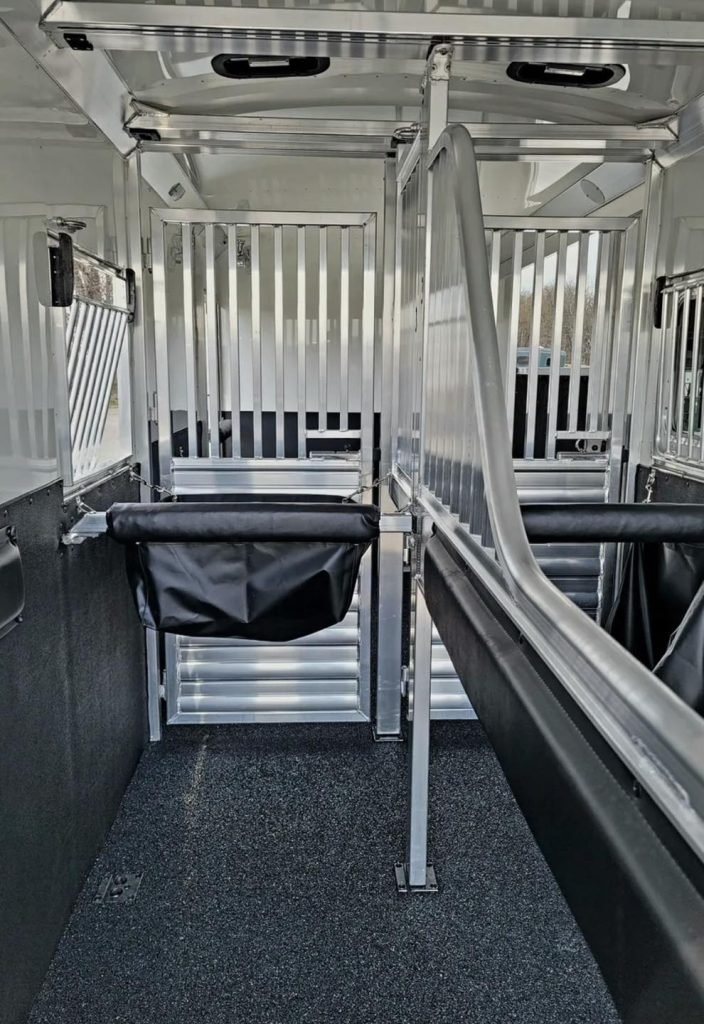 2023 4 Star 23 ft Horse Trailer – 2+1 Gooseneck – Internal view showing horse stall dividers and a padded breast bar
