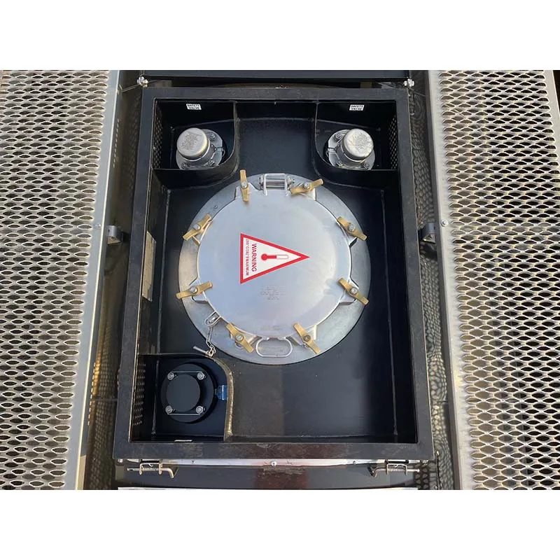 20ft Carbon Steel Tank Container – Liquid Storage and Transport – overhead closeup of tank hatch and valves between grated walkways