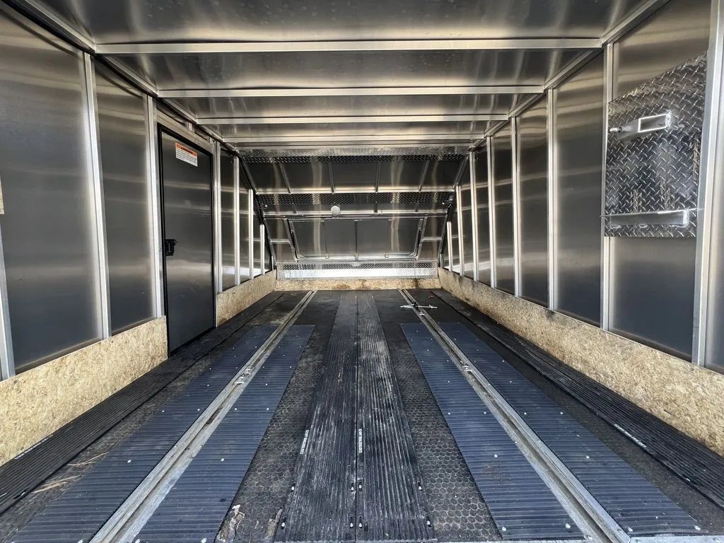 2021 Mission Trailers 2-Place Hybrid – Blackout Package – View looking from the rear into the empty aluminum interior of the trailer