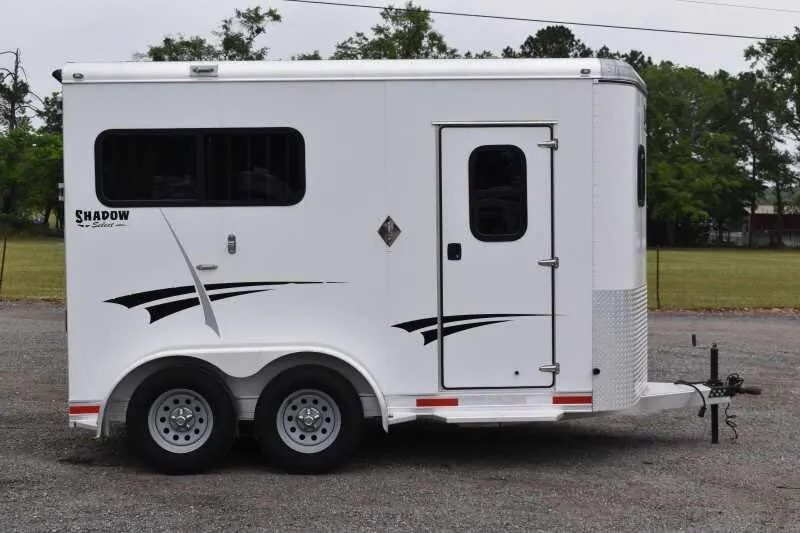 2013 Shadow 2HSL 2 Horse Trailer – Aluminum, Dressing Room – Direct side profile of the right side of the white horse trailer