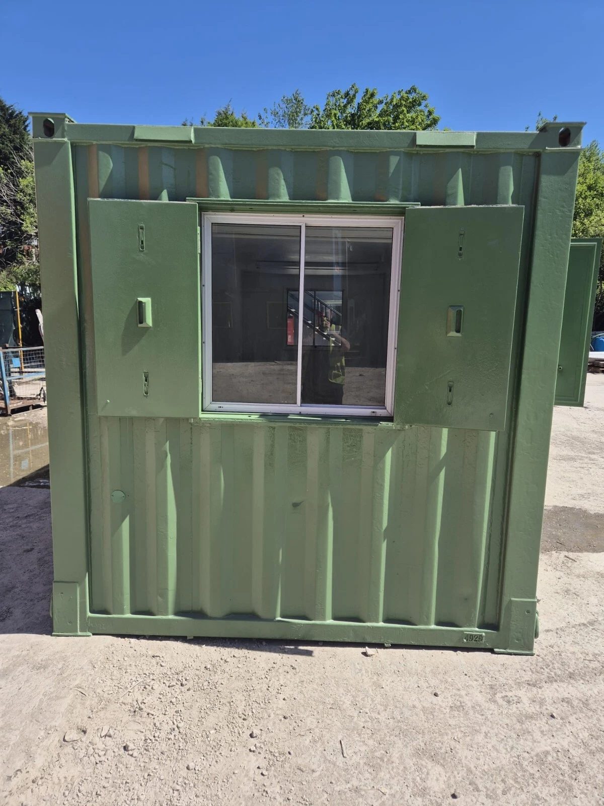 20ft Mobile Office Container – Green, Open Plan – green office container end with window and open shutters