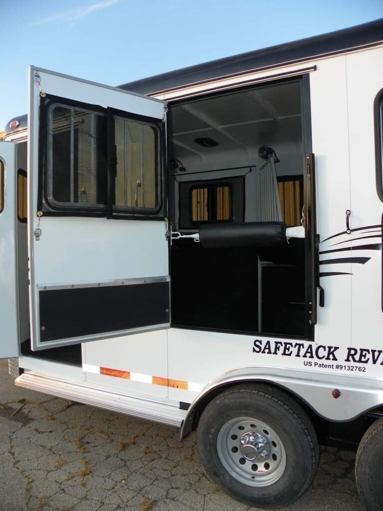 2022 Double D 2 Horse Bumper Pull – Reverse Slant – Open side door with window and black padding on the interior