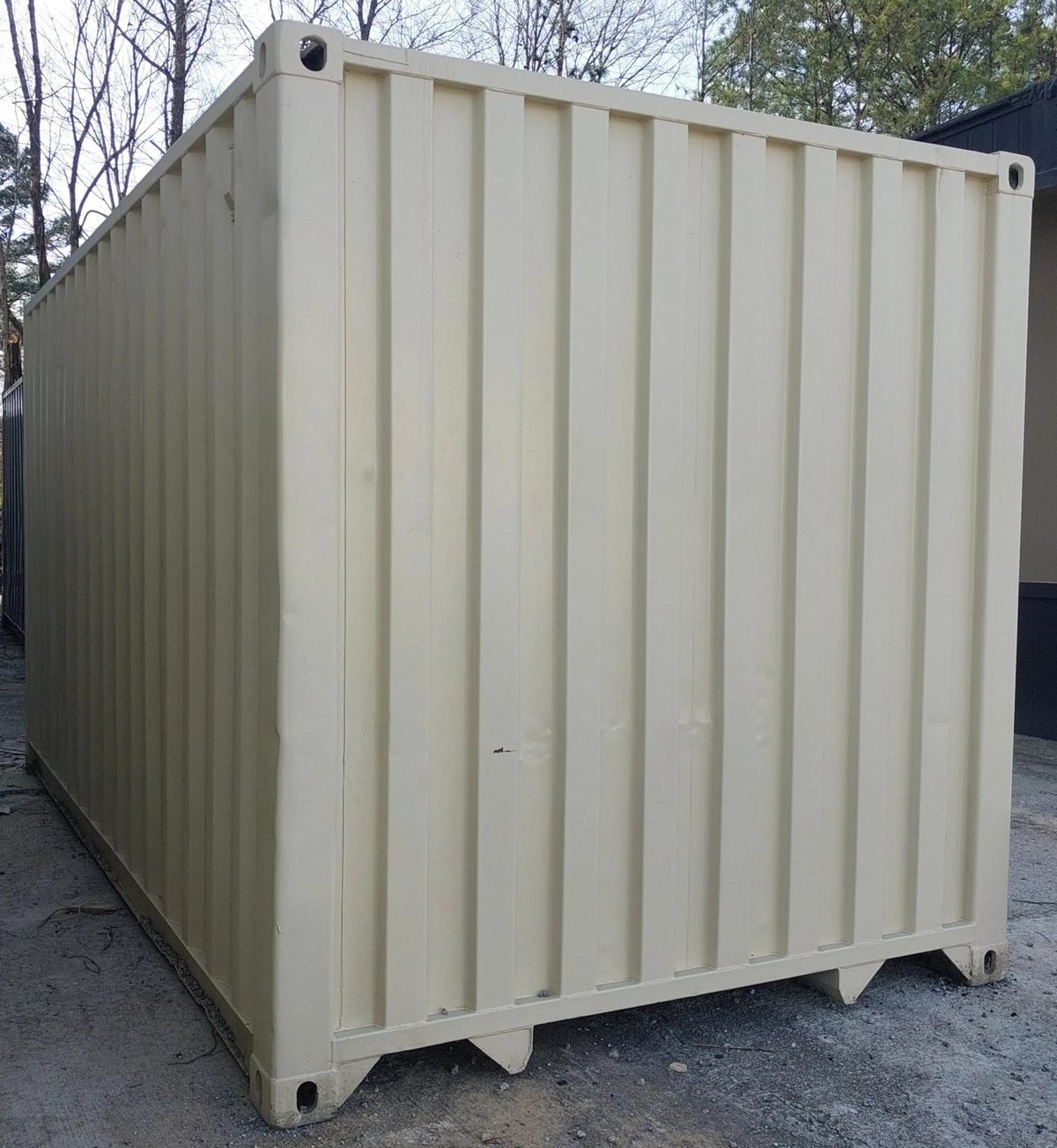 15ft Used Storage Container – Manual Roll-Up Door – Three-quarter exterior view of container rear and side without doors