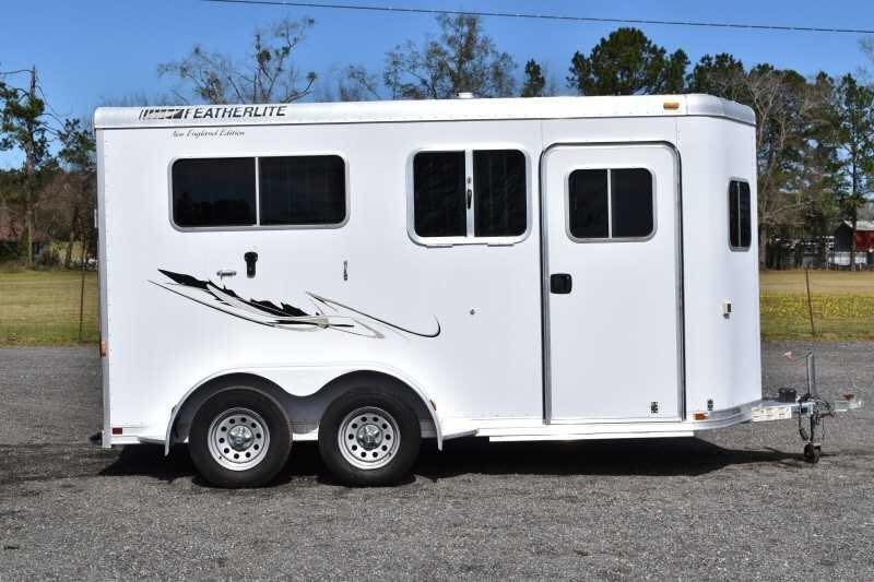 2005 Featherlite 2HST Horse Trailer – Walk-Through Dressing Room – Full side view showing windows and entry door of the trailer