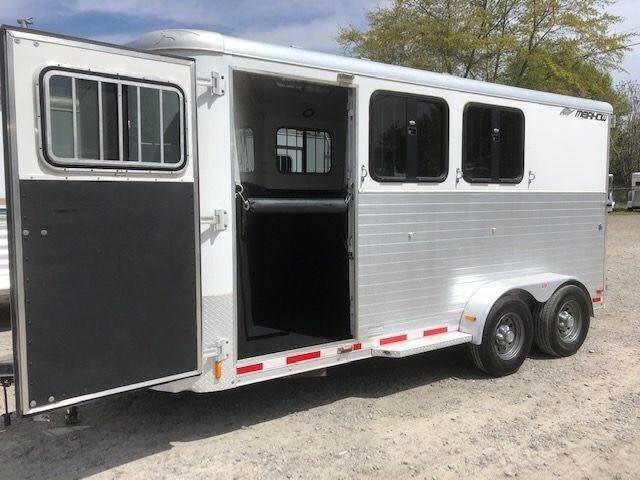 2010 Merhow 3 Horse Bumper Pull Trailer – Rear Ramp – Rear of the white trailer with a large door open revealing the interior