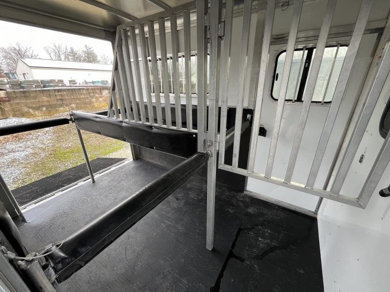 2019 Sundowner Charter 2 Horse Trailer – Warmblood Size – Interior view of the horse stalls with metal dividers and black padding