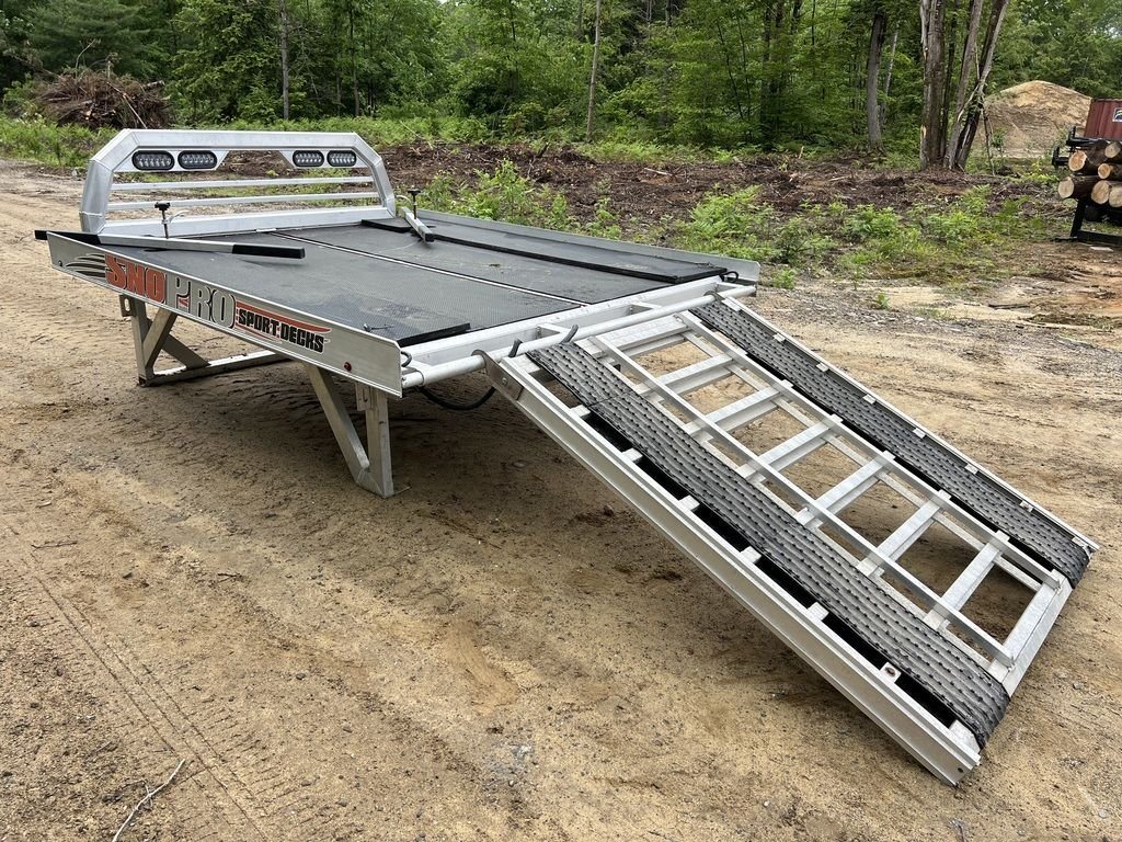 2022 Sno Pro 7 ft Sled Deck – Quad Ply Decking – Rear three quarter view with the telescoping ramp partially extended