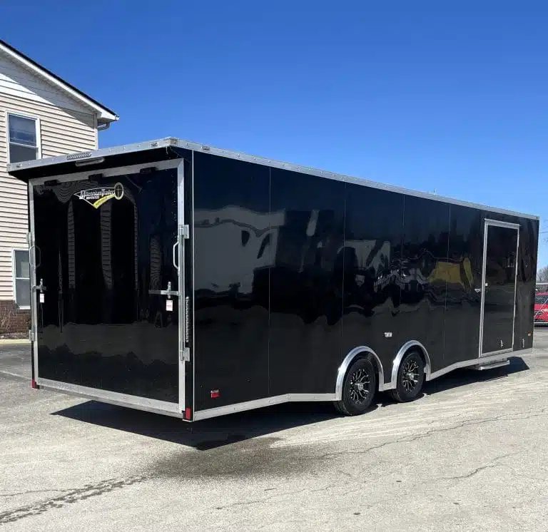 2026 Millennium 26 ft Car Hauler – Black Aluminum – Rear three-quarter view from the opposite side showing the black trailer exterior
