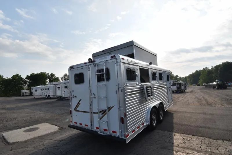 2008 C and C Trailers 4 Horse Bumper Pull – Hay Pod – Three-quarter rear view of the trailer in a lot showing the ladder and roof box