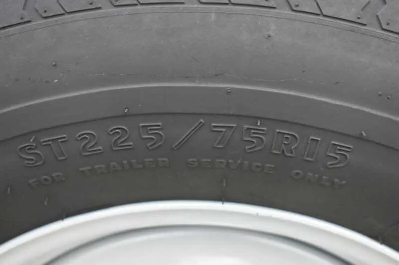 2016 Shadow 2HBP 2 Horse Bumper Pull Trailer – Aluminum – Close up of tire sidewall showing size markings and rubber texture