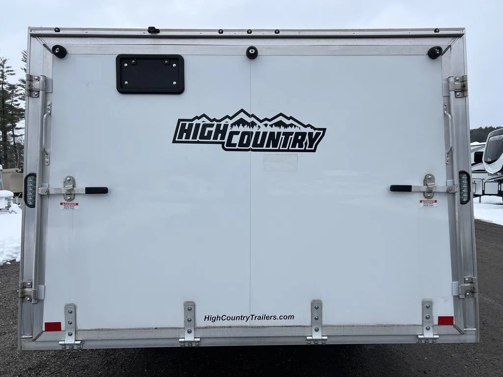 2022 High Country 12 ft Hybrid Trailer – Track Mats – Straight-on rear view of the trailer doors with manufacturer logo visible