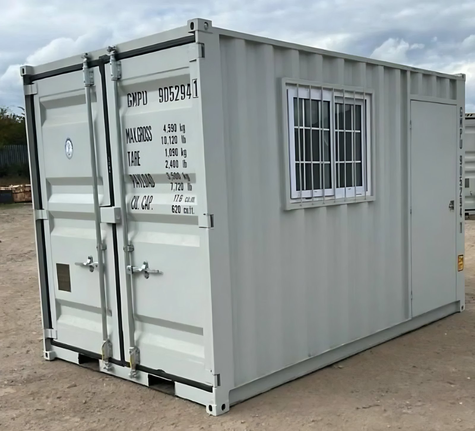 9ft Container Office – Side Entry and Barred Window – three-quarter container office exterior with window and side door