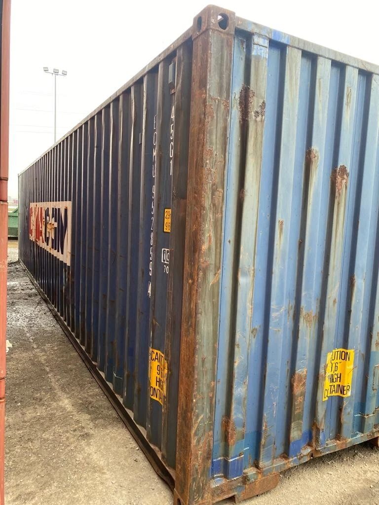 40ft Used Shipping Container – Standard Dry Storage – weathered blue shipping container with rusted sides and closed end