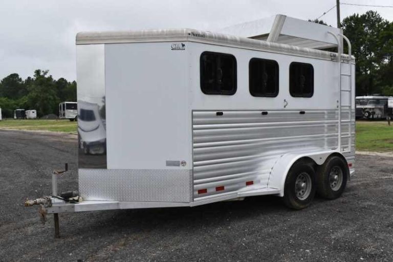 2012 CM 3 Horse Bumper Pull Trailer – Aluminum, Hayrack – Three-quarter front view showing the hitch and the driver side of the trailer